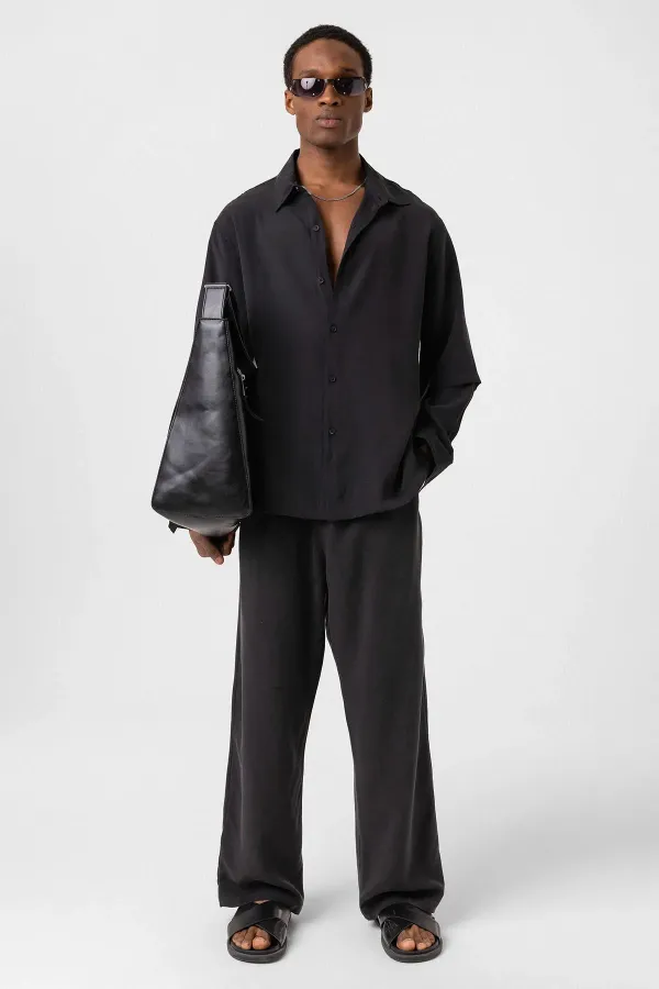 Chemise noire oversize à double manche