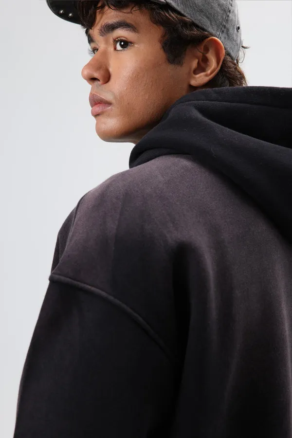 Sweat à capuche noir oversize imprimé et délavé