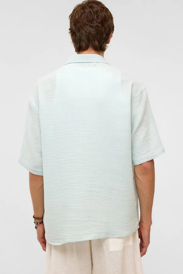 Chemise oversize à manches courtes en mousseline, bleue