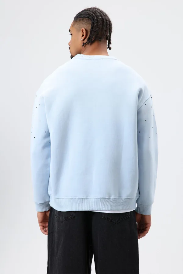 Sweat-shirt oversize bleu ciel à détails pierre délavée