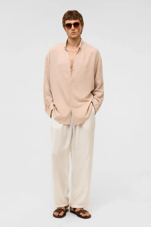 Chemise oversize à manches longues en lin beige