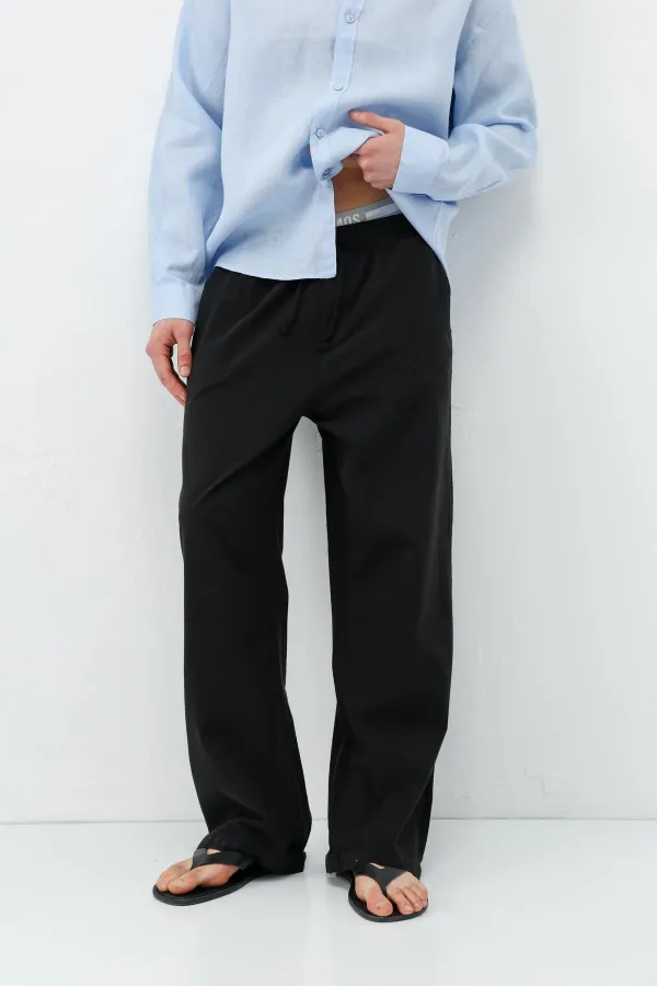 Pantalon ample en lin noir avec taille élastiquée