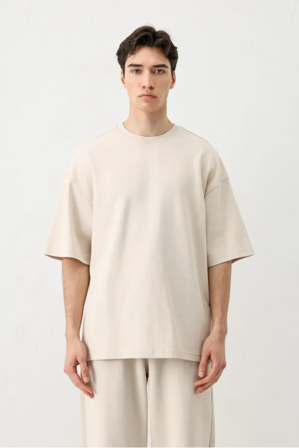 T-shirt oversize délavé à manches courtes couleur pierre.