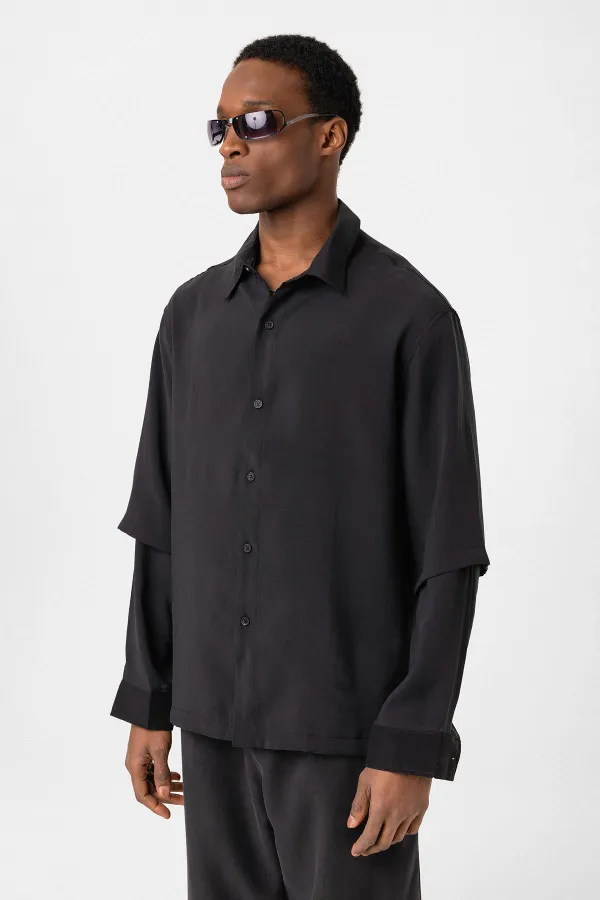 Chemise noire oversize à double manche