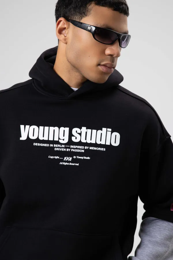 Sweat à capuche imprimé oversize noir