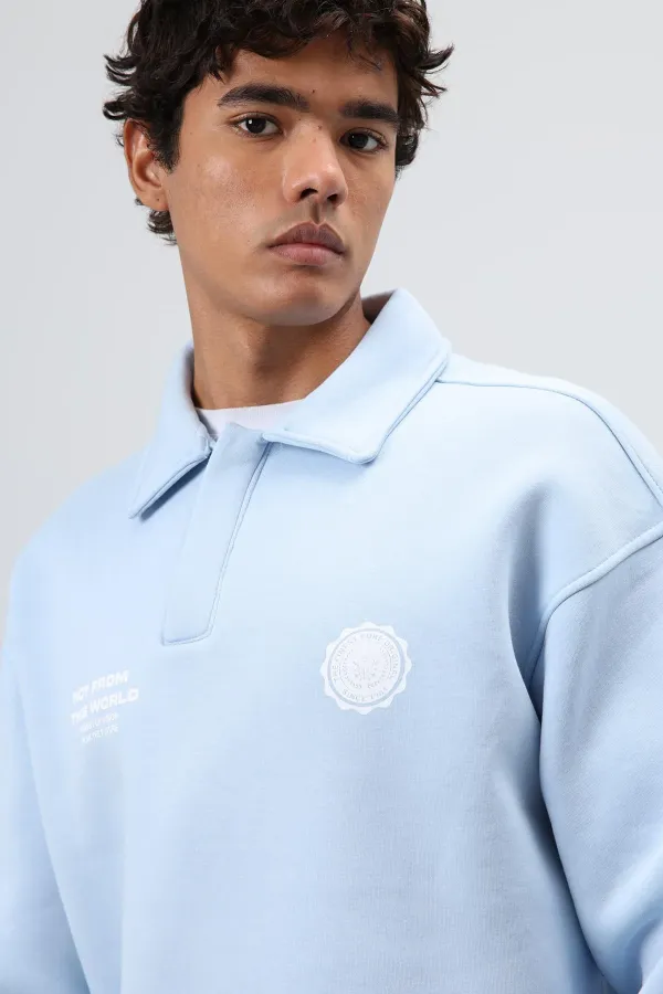 Sweat-shirt oversize à col polo imprimé délavé bleu ciel