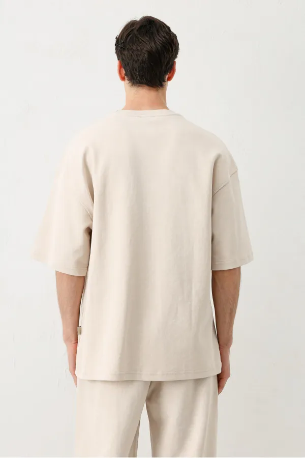 T-shirt oversize délavé à manches courtes couleur pierre.