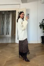 Jupe midi à pois ornée de dentelle