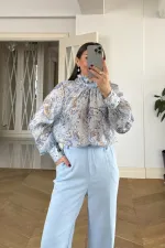 Chemisier à manches longues et col châle à motifs