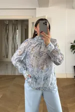 Chemisier à manches longues et col châle à motifs