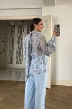 Chemisier à manches longues et col châle à motifs