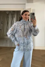 Chemisier à manches longues et col châle à motifs