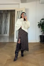 Jupe midi à pois ornée de dentelle