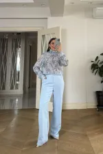 Chemisier à manches longues et col châle à motifs