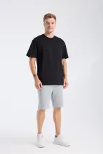 T-shirt à manches courtes pour homme, coupe ample, en tissu noir