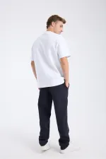 T-shirt blanc à manches courtes et coupe ample pour homme