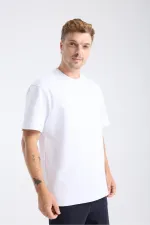 T-shirt blanc à manches courtes et coupe ample pour homme