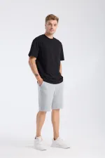 T-shirt à manches courtes pour homme, coupe ample, en tissu noir