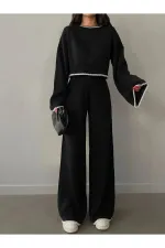 Ensemble pantalon en maille avec détails brodés sur le devant