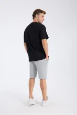 T-shirt à manches courtes pour homme, coupe ample, en tissu noir