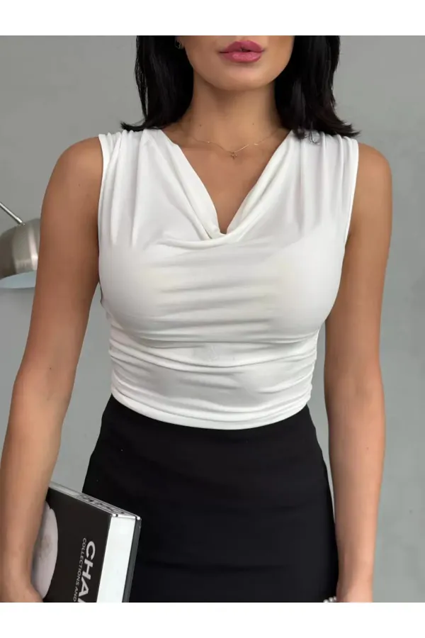 Chemisier noir sans manches drapé à col en V pour femme