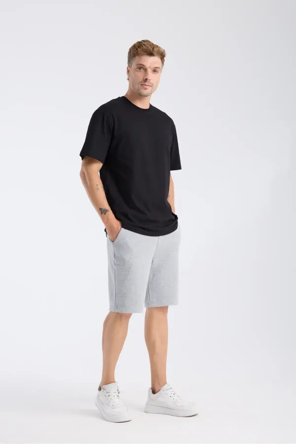 T-shirt à manches courtes pour homme, coupe ample, en tissu noir