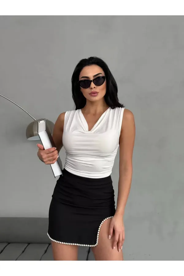 Chemisier noir sans manches drapé à col en V pour femme