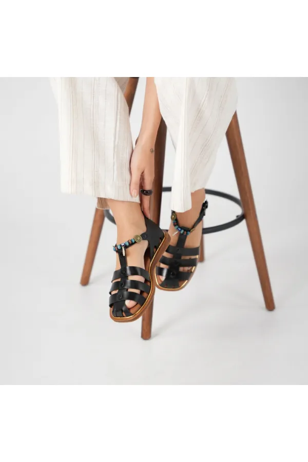 Sandales plates en cuir noir Cali pour femmes