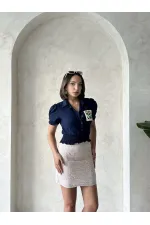 Chemise brodée bleu marine Topshow en gros