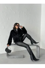 Manteau en fourrure noire Topshow en gros