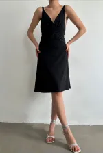 Robe Topshow noire à bretelles et col en V au-dessus du genou (vente en gros)