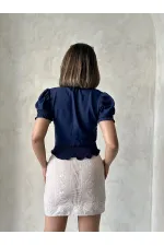 Chemise brodée bleu marine Topshow en gros