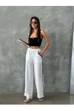 Pantalon Topshow crème en soutache avec détails, vente en gros