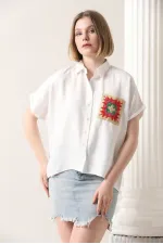 Chemise Topshow crème à fleurs et poches en gros