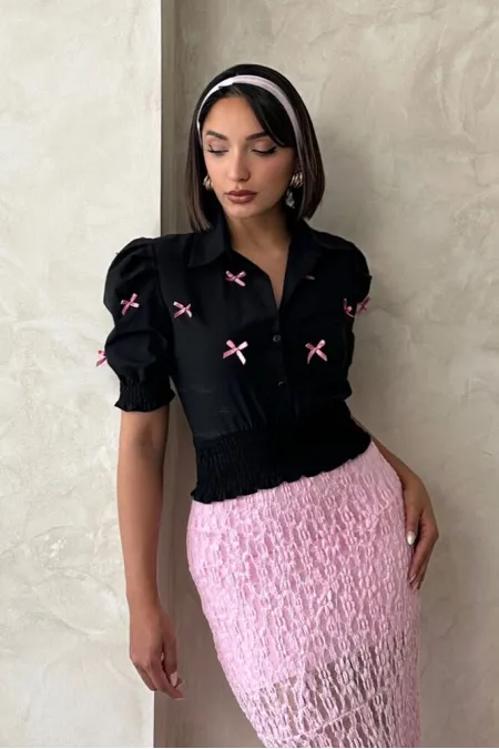 Chemise en gros avec jupe sans manches et boutons - Noir | Topshow