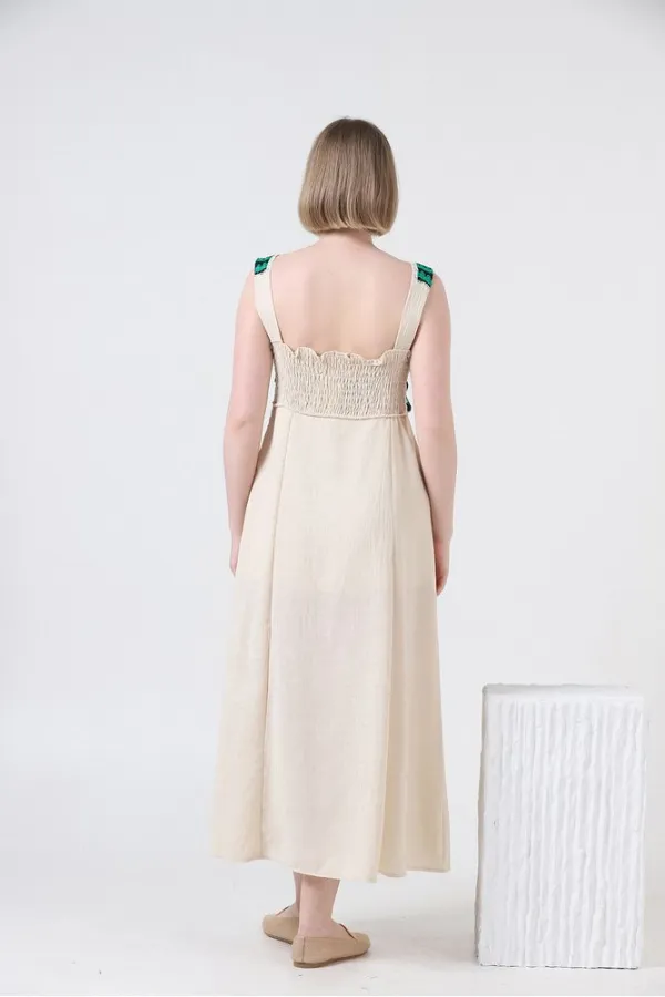 Robe Topshow en lin à bretelles et application de pierres émeraude