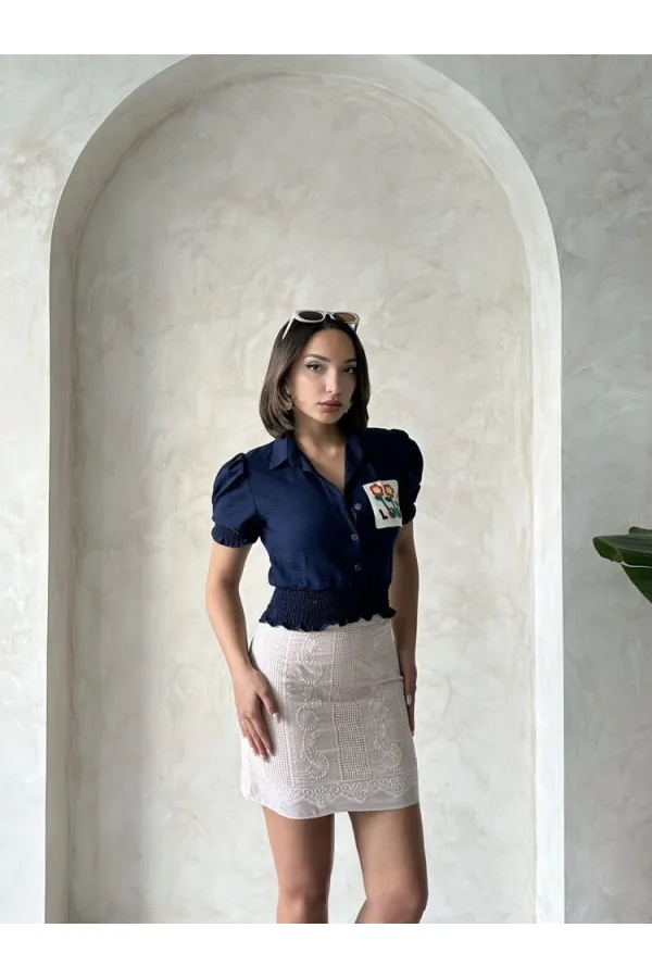 Chemise brodée bleu marine Topshow en gros