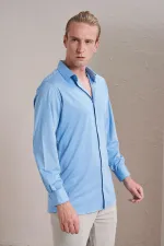 Chemise Kagi bleue à manches longues pour homme, coupe ajustée, en coton mercerisé.