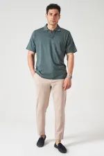 T-shirt Supreme en tissu vert pin à col en V pour homme