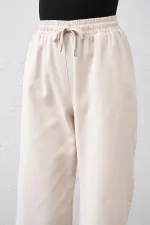 Kadın Taş Beli Bağlamalı Geniş Piş Dikişli Paça Pantolon
