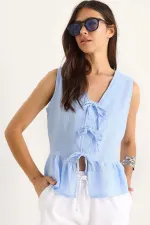 Kadın Mavi Önü Bağlamalı Kolsuz Eteği Fırfırlı Muslin Bluz