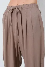 Kadın Toprak Beli Lastikli Havuç Kesim Keten Pantolon