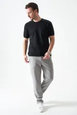 T-shirt noir à col rond pour homme avec détail de large bande sur les épaules