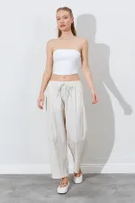 Pantalon ample pour femme avec taille élastiquée et poche cachée