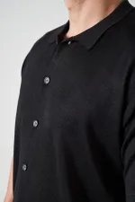 Chemise en maille de coton noire à manches courtes pour homme