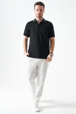 T-shirt homme noir à col boutonné en piqué modal