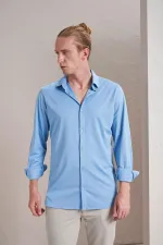 Chemise Kagi bleue à manches longues pour homme, coupe ajustée, en coton mercerisé.