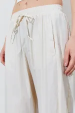 Pantalon ample pour femme avec taille élastiquée et poche cachée