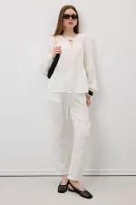 Women's Off-White Muslin Pants with Elastic Waist and Carrot Leg