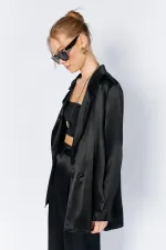 Veste en satin noir et or à un bouton pour femme